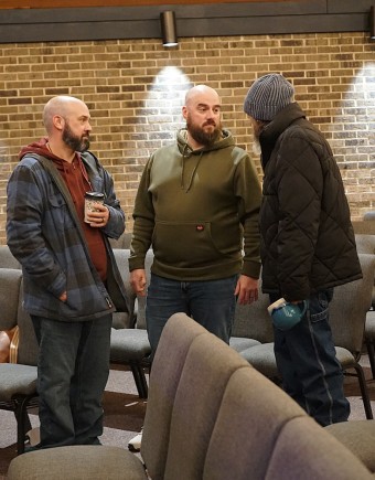 a group of men talking